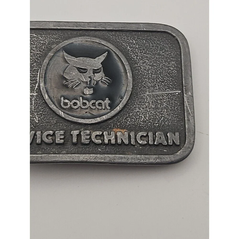 Lot of 2 Bobcat Belt Buckles
